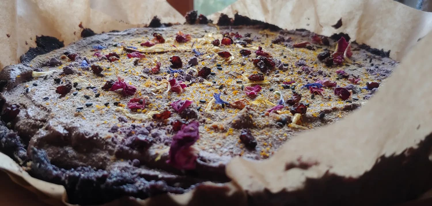 Raw chocolate tart with red fruits
