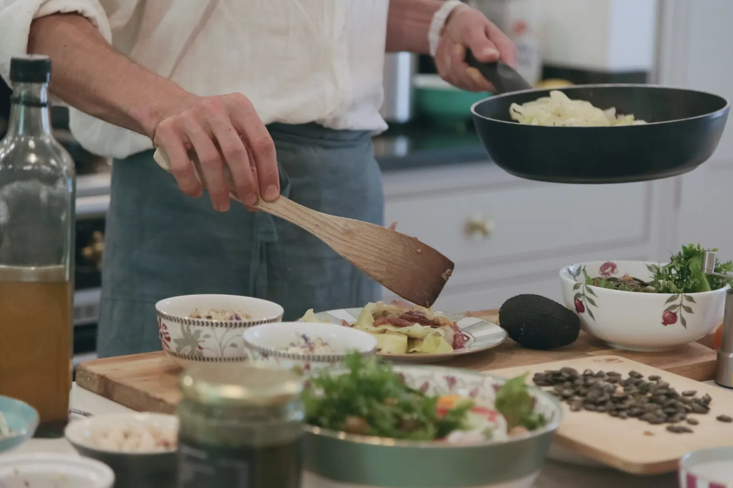 The chef preparing, bowls of ingredients